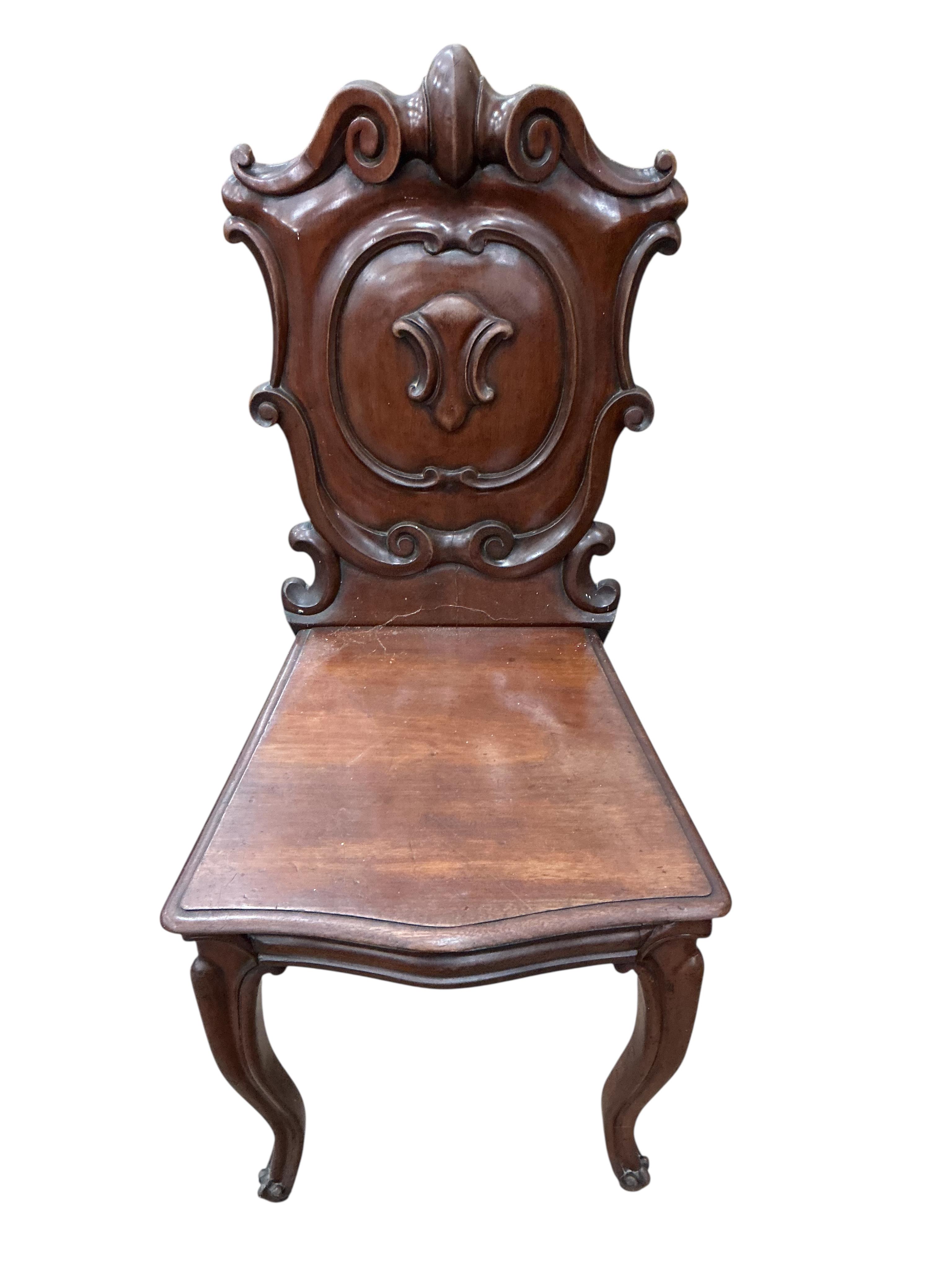 Three (two plus one) Victorian mahogany hall chairs